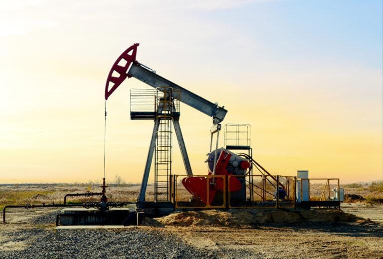 Oil drilling site using oil-based mud and drilling fluid additives